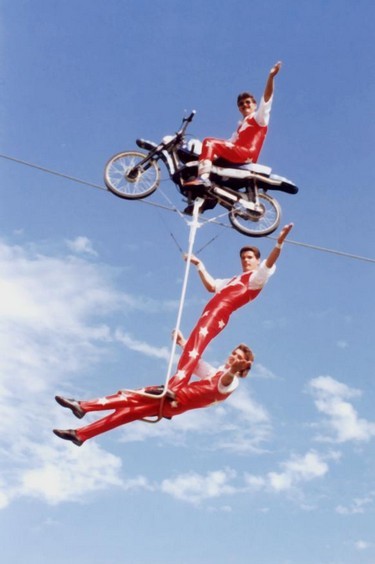 Aerial motorcycle stunt display team.