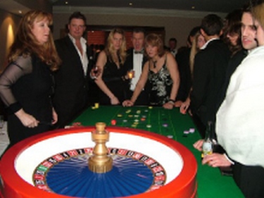 Using professional croupiers and real Casino-style equipment.