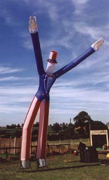 These towering figures attract customers from miles around