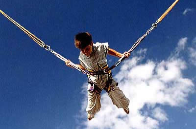 Jump on the trampoline and bounce up with bungee elastic